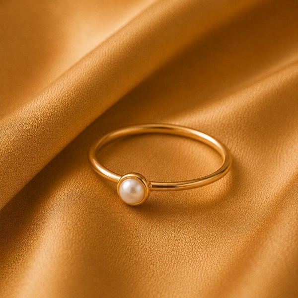 Delicate gold ring with pearl accent