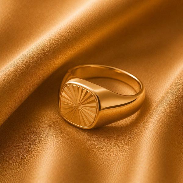 Signet-style ring with sunburst engraving